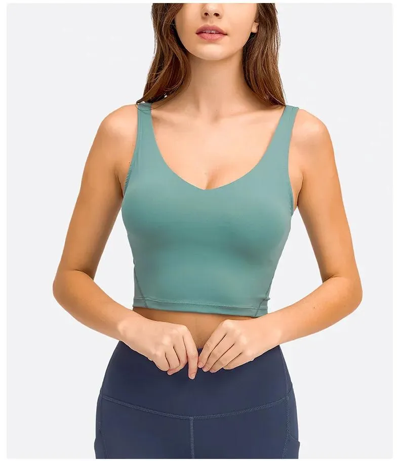 Conjunto Venta caliente Venta al por mayor Pop Mujeres Sujetador deportivo Tight Gym Crop Top Yoga Chaleco a prueba de golpes con almohadilla para el pecho Ropa de fitness de alta resistencia