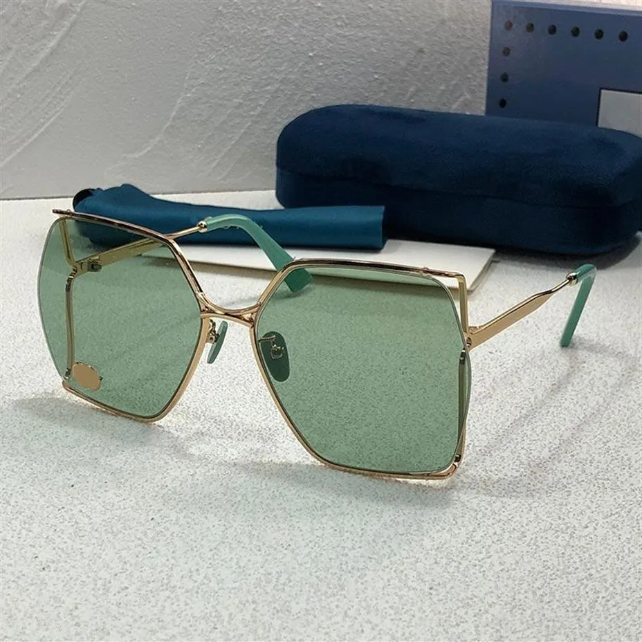 Solglasögon för kvinnor Klassiska varumärke Hollow Plated Metal Frame 0187 Fashion Art Glasses Outdoor UV Designer Solglasögon268L