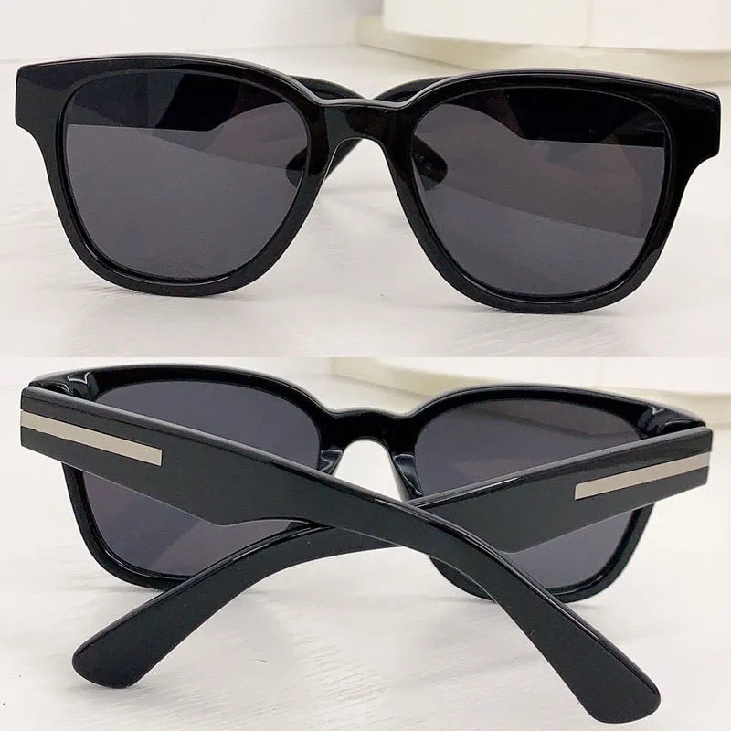 Lyxdesigner Mens Fashion Brand med jonisk metallplack solglasögon för män kvinnor svart acetat fiber ram grå lins uv400 mode eleganta solglasögon OPR A04S