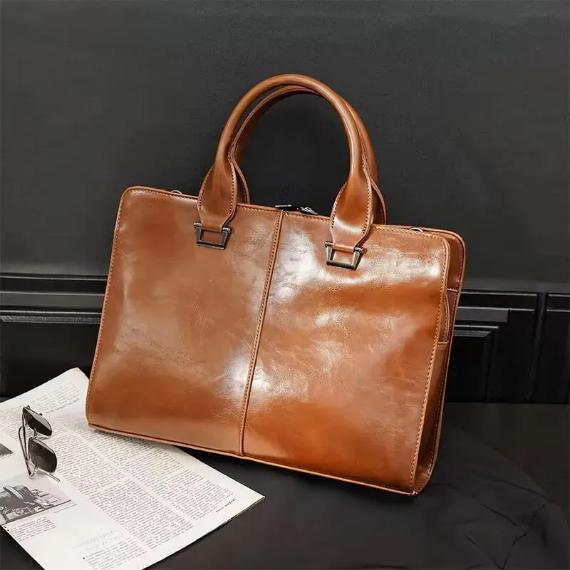 Briefcases Luxury Soft Leather Men s Briefcase Retro Large Capacity Handbag Tote Bag Male Shoulder Messenger Business Laptop 231216