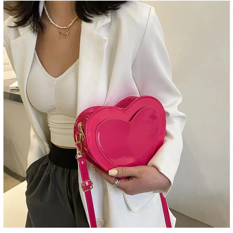 Torby wieczorowe torebki Crossbody Cute brzoskwiniowe torebki w kształcie serca Trendy moda prosta zachodnia styl dla kobiet 231216