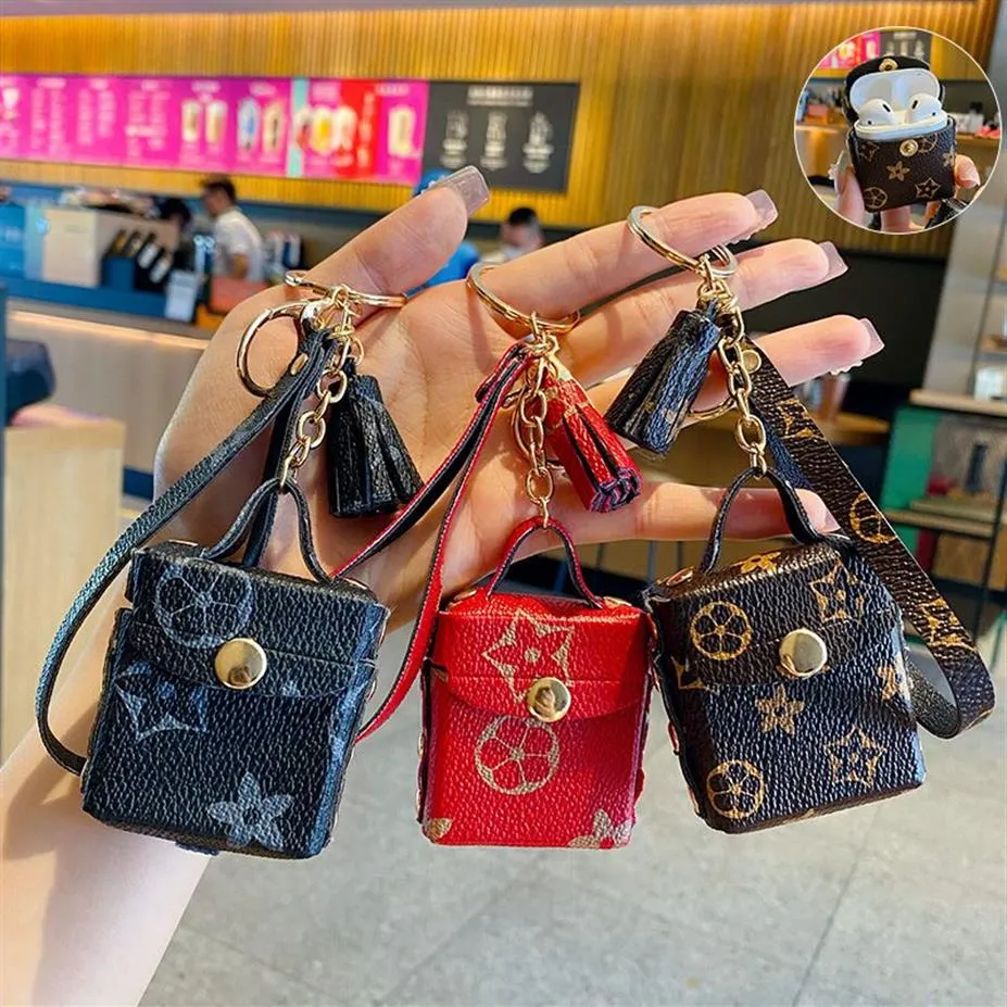 Fashion Designer Airpods Case Keychains Trinkets PU Leather Key Rings Chains Jewelry Brown Flower Pendant Bag Charms Keyrings Car 234V