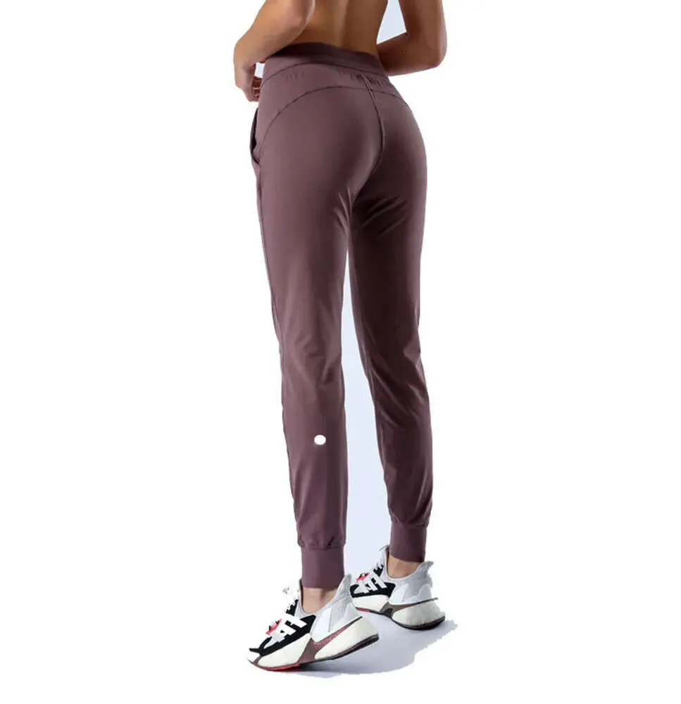 LL femmes Yoga neuvième pantalon pousser Fitness Leggings doux taille haute hanche ascenseur élastique décontracté Jogging 7 couleurs L28989