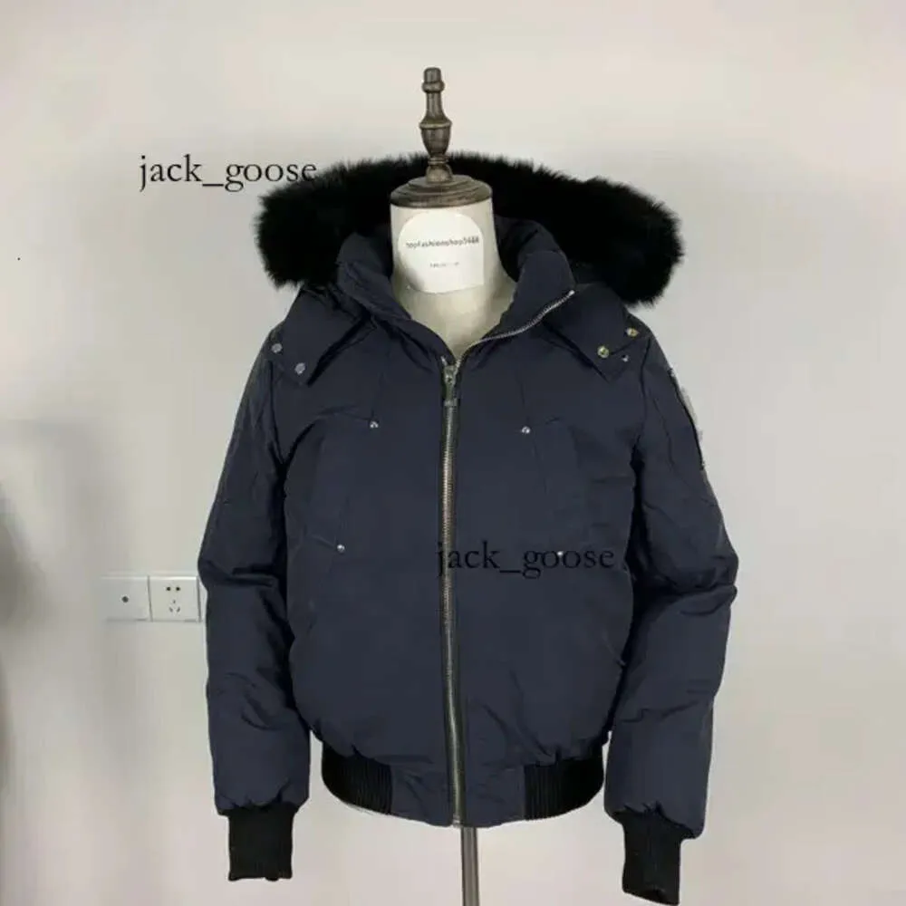 Couteau Knuckles Duster Designer Hommes Hiver Vers Le Bas Canada Veste Manteaux Coupe-Vent Pardessus Imperméable Puffer Épais Colla Véritable Fourrure De Loup 454