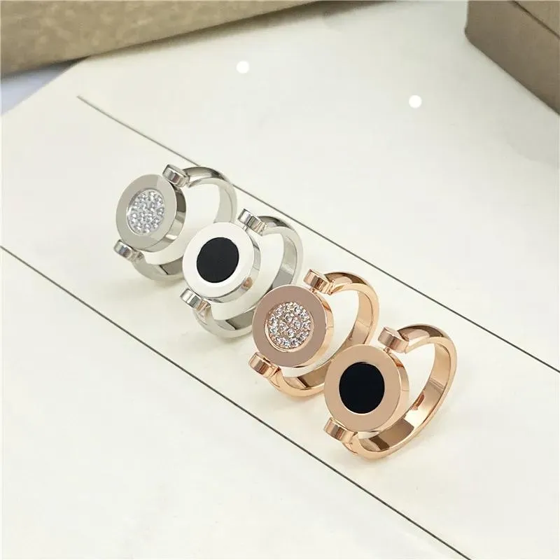 Rings Titanium stainless steel couples fashion round cake classic ring doublesided black and white studded couples ring ring.