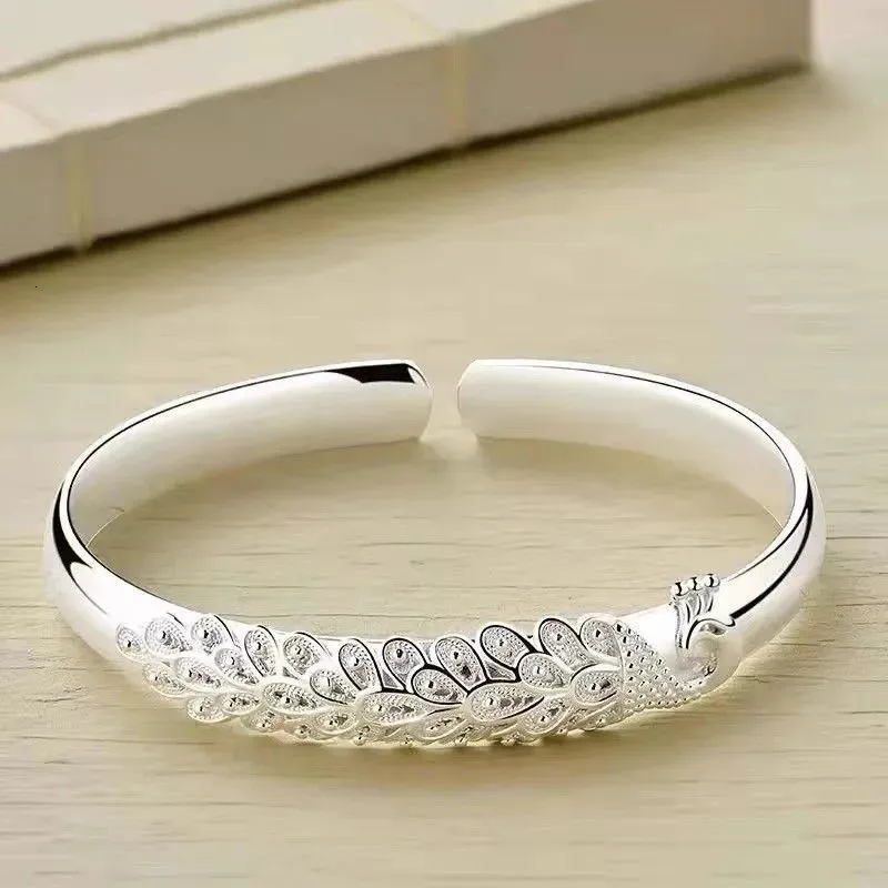 Bracciale rigido in argento sterling 925 elegante braccialetto con schermo di apertura Pavone Braccialetti per le donne moda festa accessori da sposa regalo di gioielli 231219