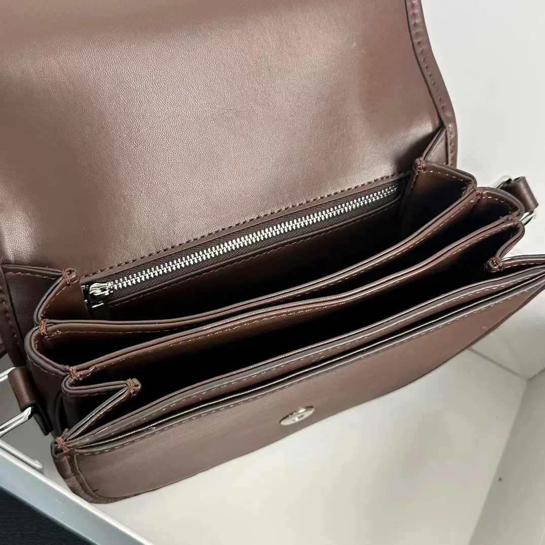 Designer Bag Hot selling Saddle Bag Women`s Crossbody Bag High end Fashion Cowhide Material Button Opening and Closing Types Available