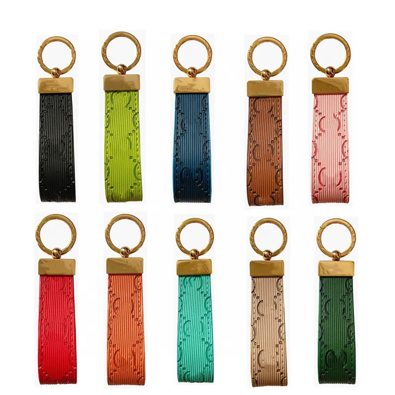 G varumärke nyckelringar för män kvinnor läder bokstav graverad logotyp högkvalitativ bilnyckelknappar Keyring nyckel Anti-Lost Fashion Accessories 10 Color Stock Classic Leather Top