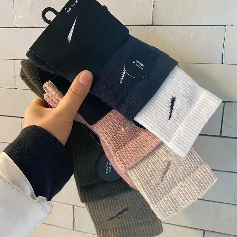 Nouvelle mode chaussettes de sport exécutif publicité NK chaussettes en coton pour hommes et femmes sauvages Ins chaussettes de mode chaussettes décontractées tendance