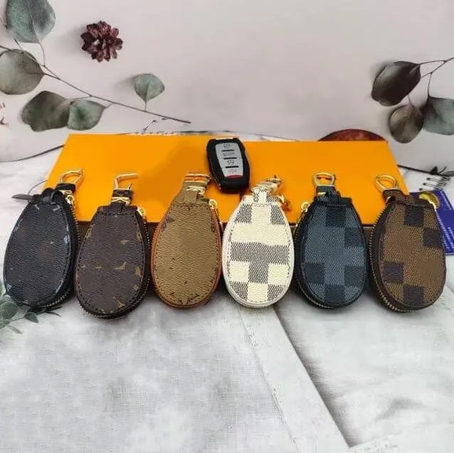 Bolsos de cuero verdadero de seis colores Joyería de diseñador famoso Bolsa de almacenamiento de llaves de coche Bolsa de llavero de moda para hombres y mujeres con caja de regalo original louiselies vittonlies