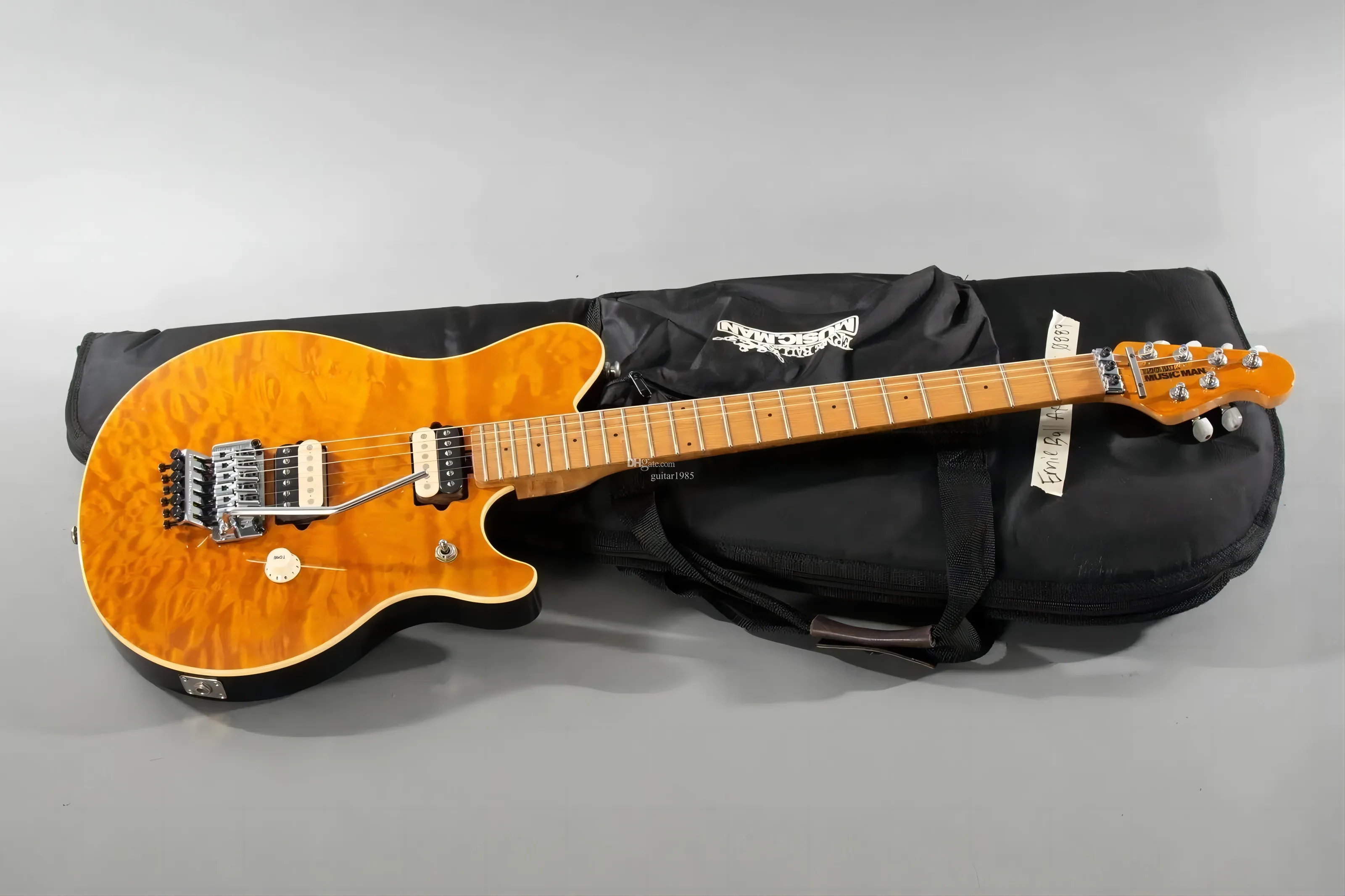 Ernie Ball Music Man Axis EX Translucent Gold Quilt E Gitarre 258 