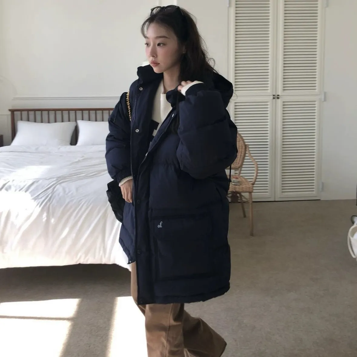 Hiver nouveau concepteur coréen lâche décontracté chaleur fermeture éclair couleur unie à capuche vers le bas manteau
