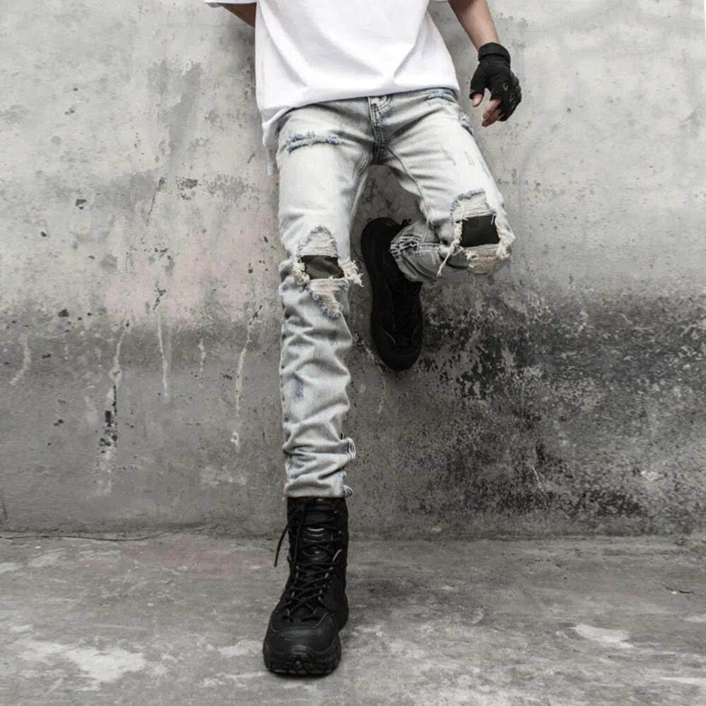 Europe United States High Street Camouflage tissu apposé patch lavage Les trous d'eau font les vieux jeans pantalon de hip hop masculin zipper