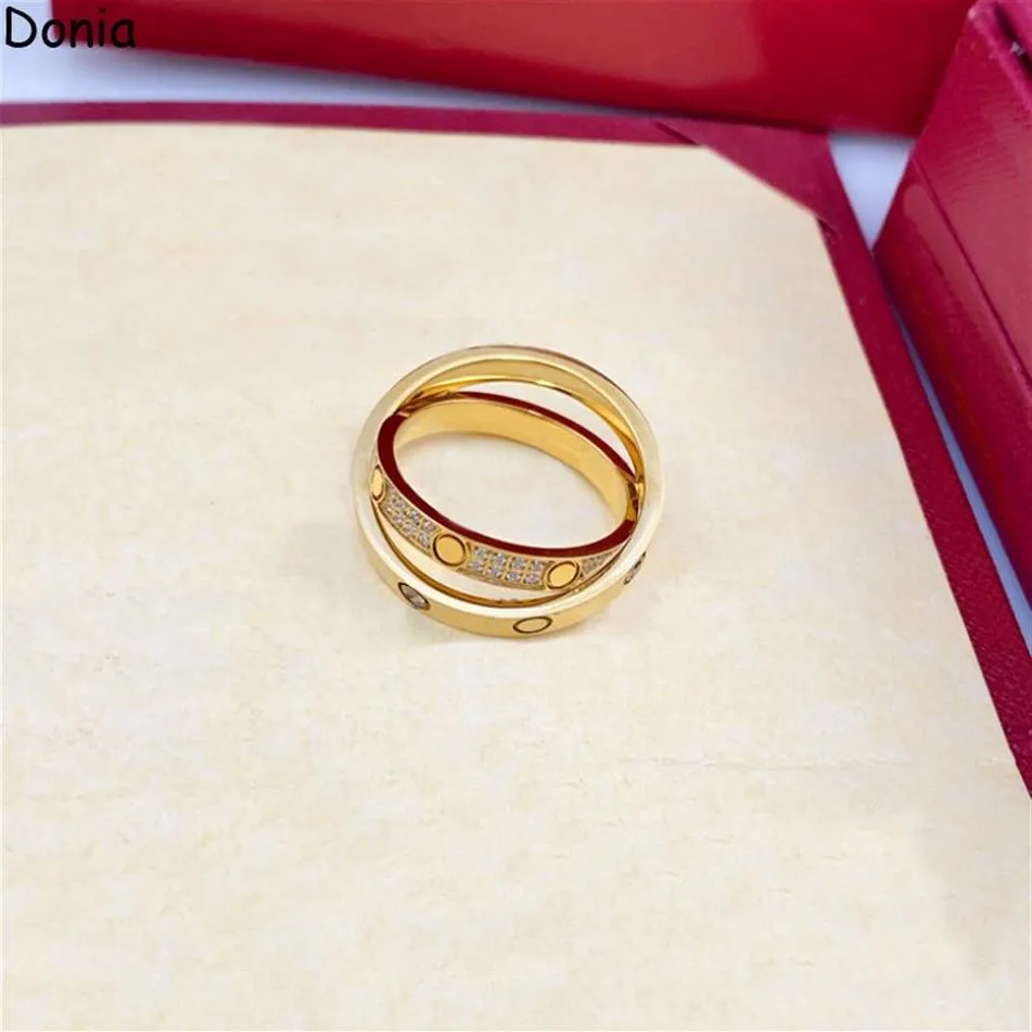 Donia mücevher lüks yüzüğü abartılı Avrupa ve Amerikan moda çift halka desen titanyum mikro set zirkon yaratıcı tasarım