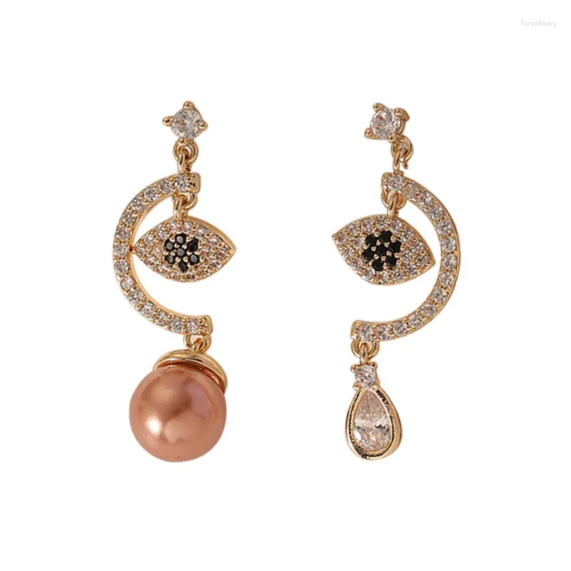 Boucles d'oreilles enveloppées Europe et Amérique INS Micro-alimentaire Zircon Asymmetric Eye 925 Silver Needle High Sense Niche Femme de luxe