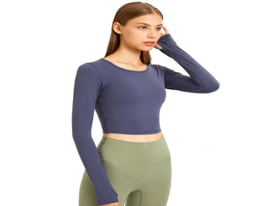 09 Crop Top Donna T-shirt da yoga Top sportivo solido Camicie da corsa a maniche lunghe Sexy Ombelico esposto Quick Dry Fitness Gym Abbigliamento sportivo9623044