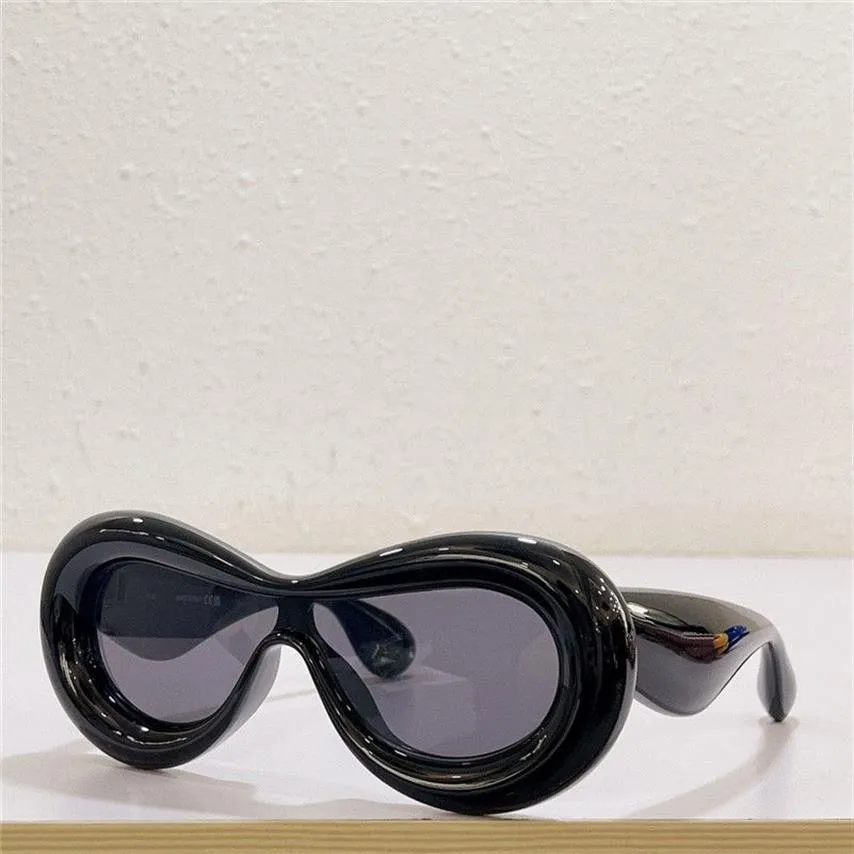 Nouvelles lunettes de soleil de mode 40099 Couleur de conception spéciale Frame de masque gonflé Frame Avant-Garde Fou Intéressant avec Case254i