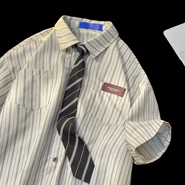 Camicia A Maniche Corte Il Colletto Polo Retro Americano Cravatta Sciolta Casual Uomini E Donne Da 10 33 DHgate