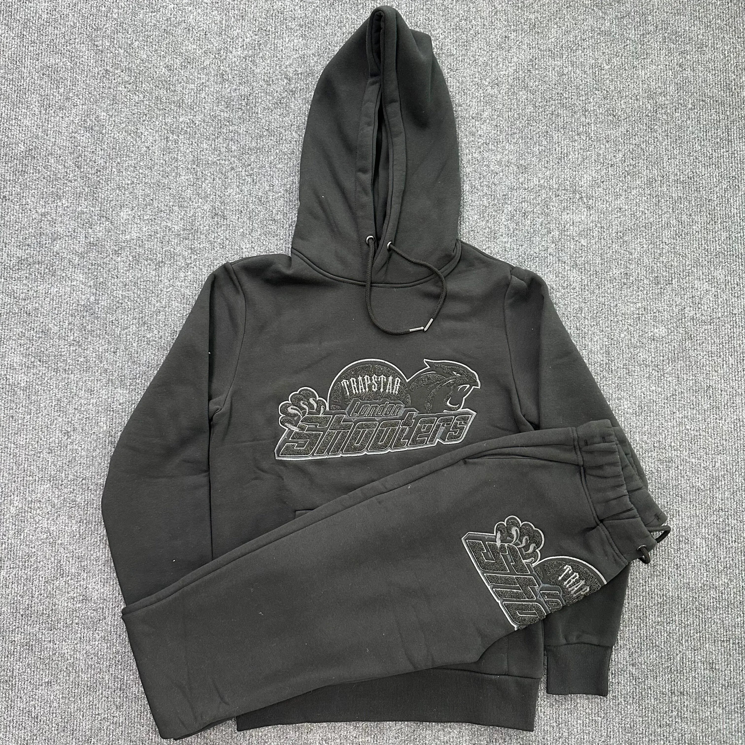 Tuta da uomo firmata Trapstar del Regno Unito Widcard Zip-nero / monocromatico 1 Felpa con cappuccio da donna ricamata di alta qualità Pantaloni da jogging Taglia EU Xs-xl