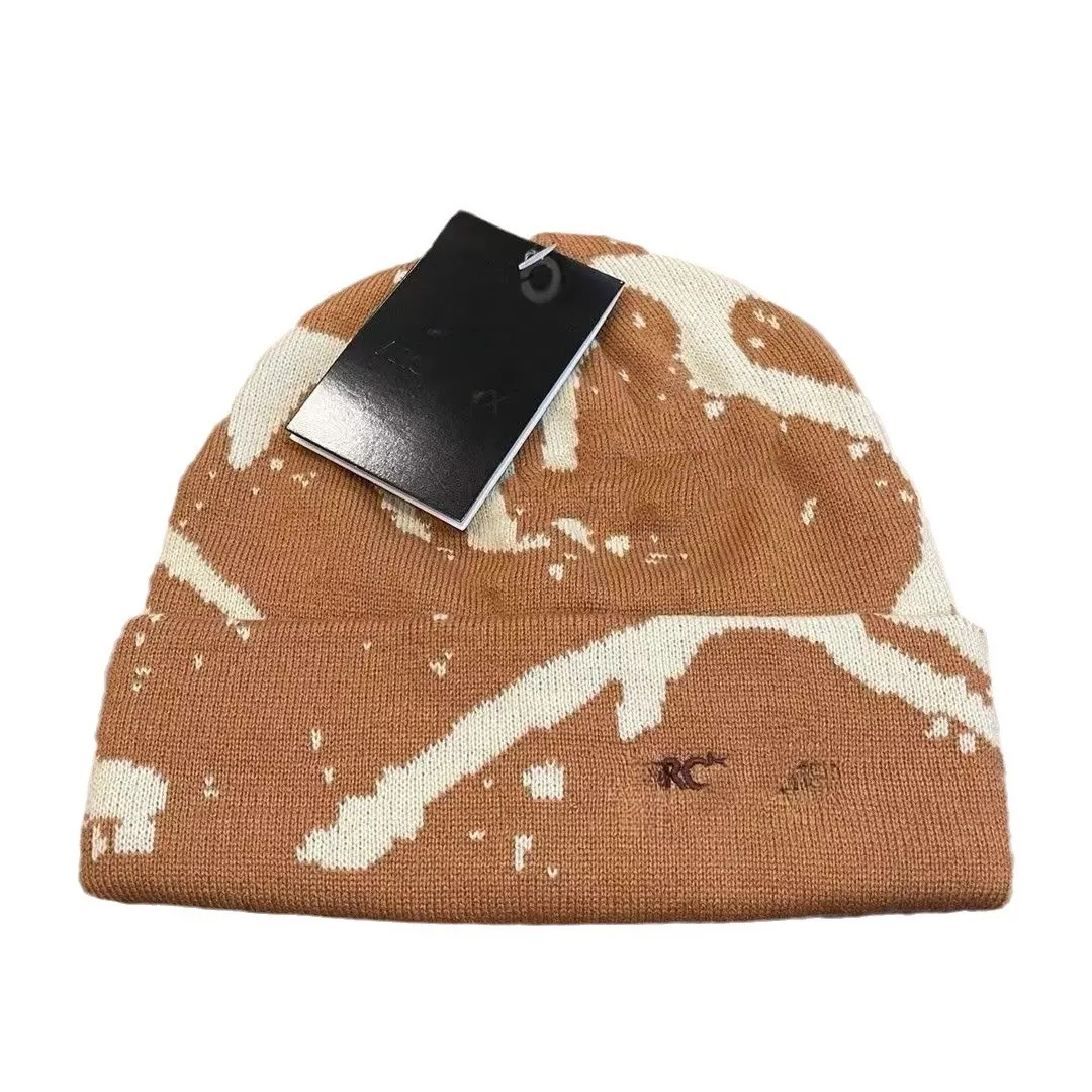 Herfst en winter buiten sport mode casual gebreide cap luxe designer hoogwaardige borrelloze cap mannen en vrouwen met dezelfde stijl beginnende herentrendbrei