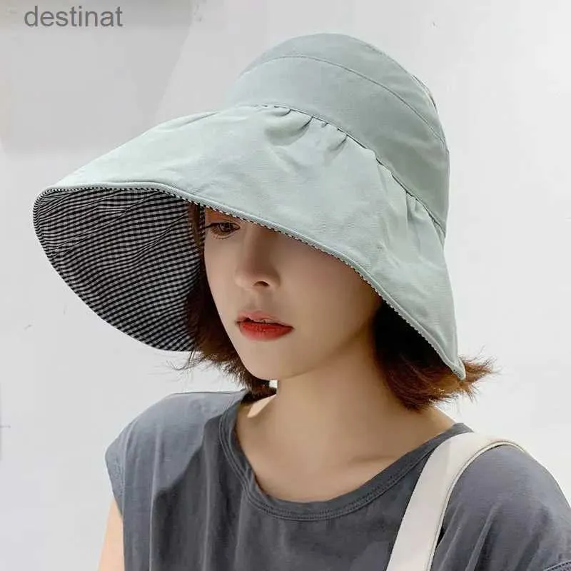 Chapeaux à bord large chapeau seau 2023 Nouvelle femelle coréenne à la mode du chapeau solaire Big Brim Uv Protection Place Vide Top Vide Top Femmes Soleil Double sidedl231221