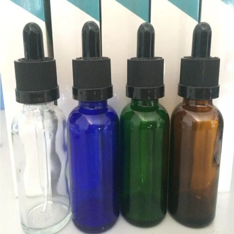 Hecho en China 660pcs/lote Medicina de vidrio Botellas de 30 ml Botella de aceite de aceite E-Liquid con tope negro a prueba de niños y tubo de pipeta de vidrio