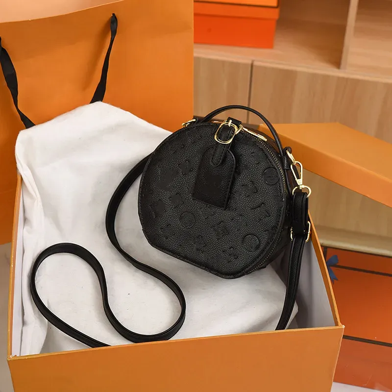 Kvalitet av kvinnors casual handväska berömd designer mode präglade runda söt läder crossbody väska singel axelväska