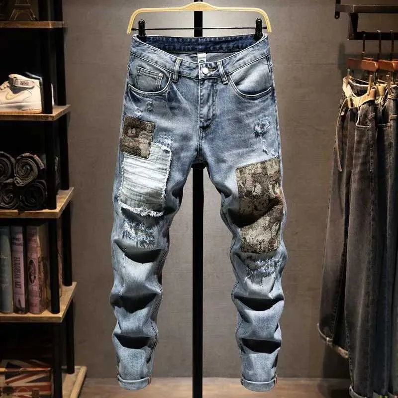 Mäns jeans 2023 Spring och Autumn New Fashion Trend Ripped Elastic Slim Ben Men's Casual Bekväma andningsbara högkvalitativa jeans 28-36 J231222