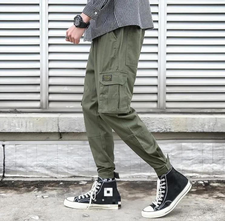 Designer di marchi gennaio Spring Streetwear Harem Jogger Pants Men Cotone Casual Sude Side Tapoche Solid Cargo Men Trousers9055055