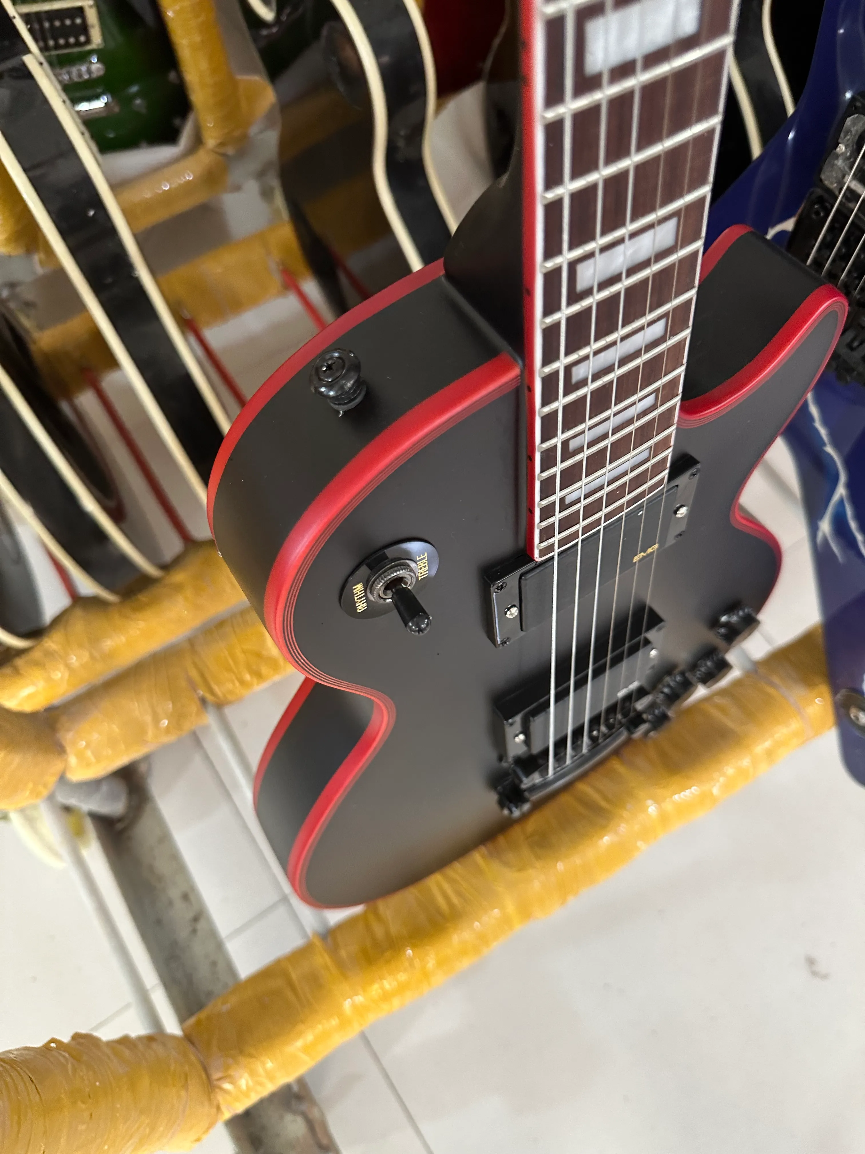 Customized electric guitar, Red logo and body wrapping, matte, black EMG cartridge, lightning package