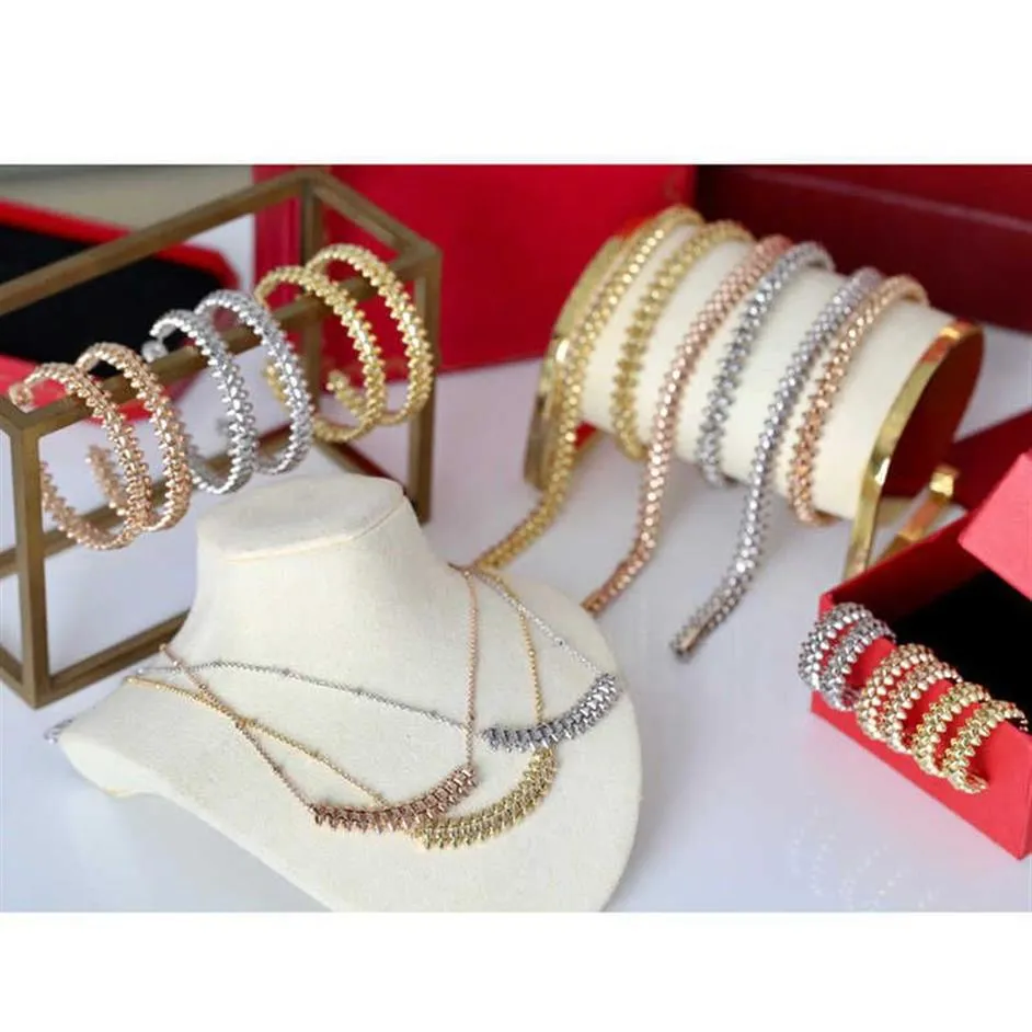 Merk mode -sieraden set voor dames goud vergulde rive stoom punk party mode botsing ontwerp oorbellen ketting armband ring223m