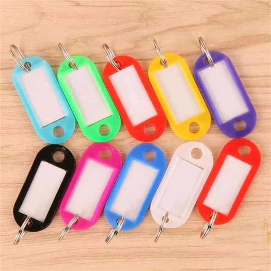 whole 100Pcs Mix Color Plastic Keychain Key Tags Id Label Name Tags With Split Ring For Baggage Key Chains Key Rings 210409251H