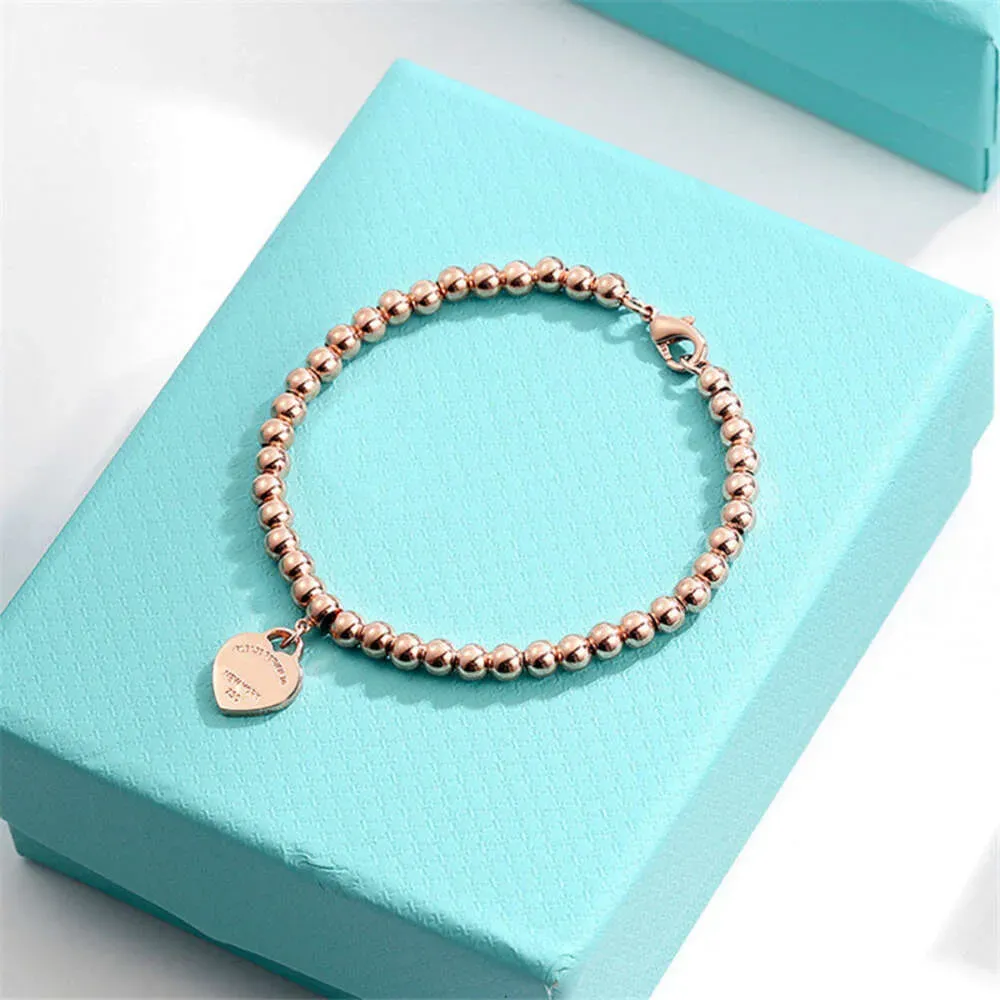 T Bangle Precision Pure Sier Smooth Face Love Peach Heart Round Pärlor Bästa vän Tiffanylys armband Womens Rose Gold Simple Fashion