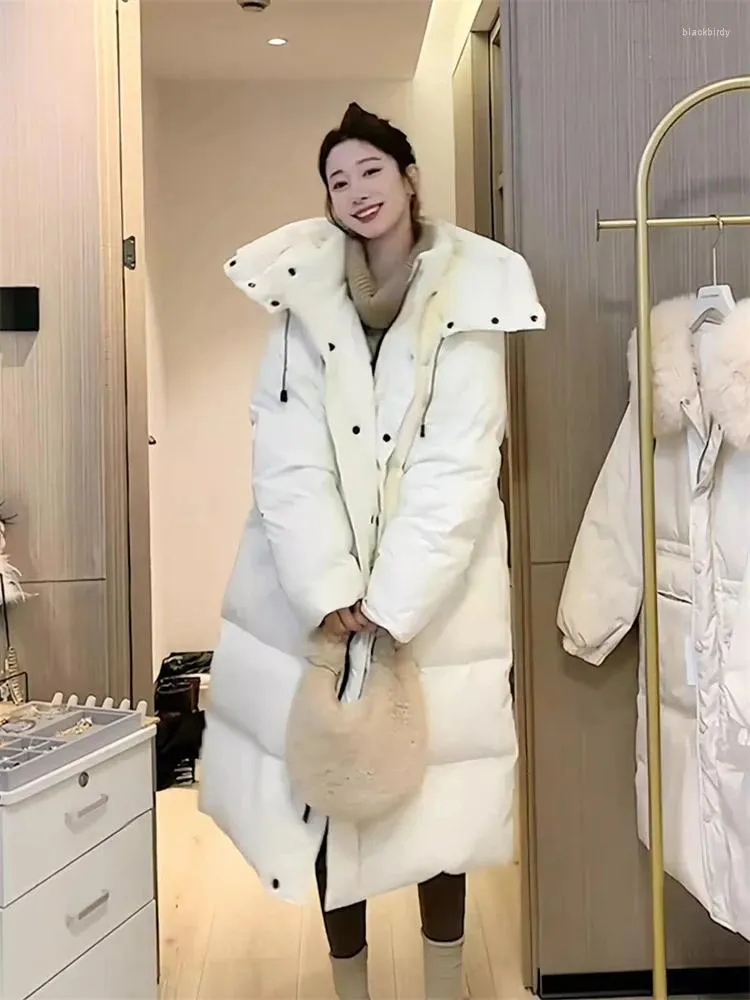 Les trenchs pour femmes vers le bas du coton manteau femme beige épaissis de chaleur parkas à capuche longue 2024 mode d'hiver