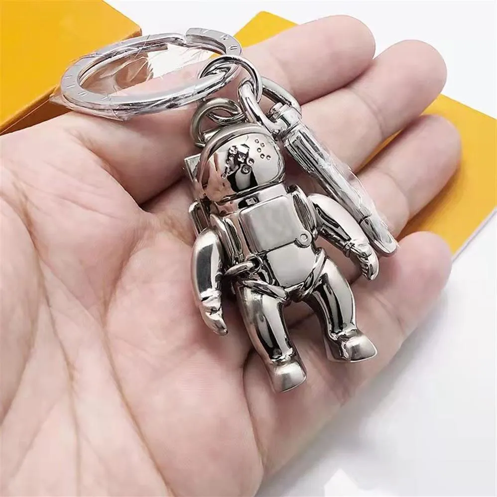 Ashion Nieuwe roestvrijstalen Spaceman Key Ring Luxe ontwerper Keychain Self Defense Hoogwaardige munt Purs Keychain Pendant Access267m