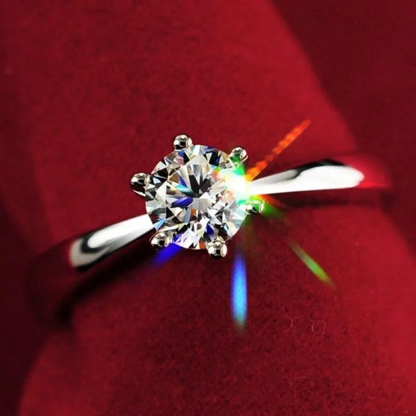 Aldrig bleka 1 0ct S925 Silverengagemang Anelring 18K Real White Gold Plated Cz Diamond Wedding Ring Women349K