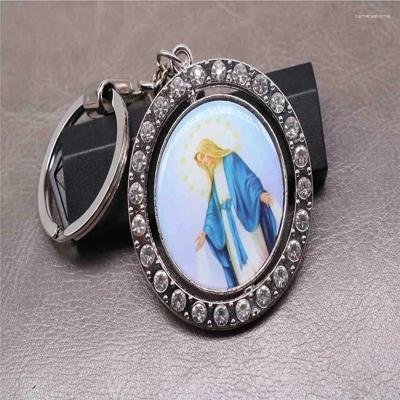 Schlüsselanhänger Das Bild ist zufällig. Religiöser Jesus Cross Key Ring. Drehen