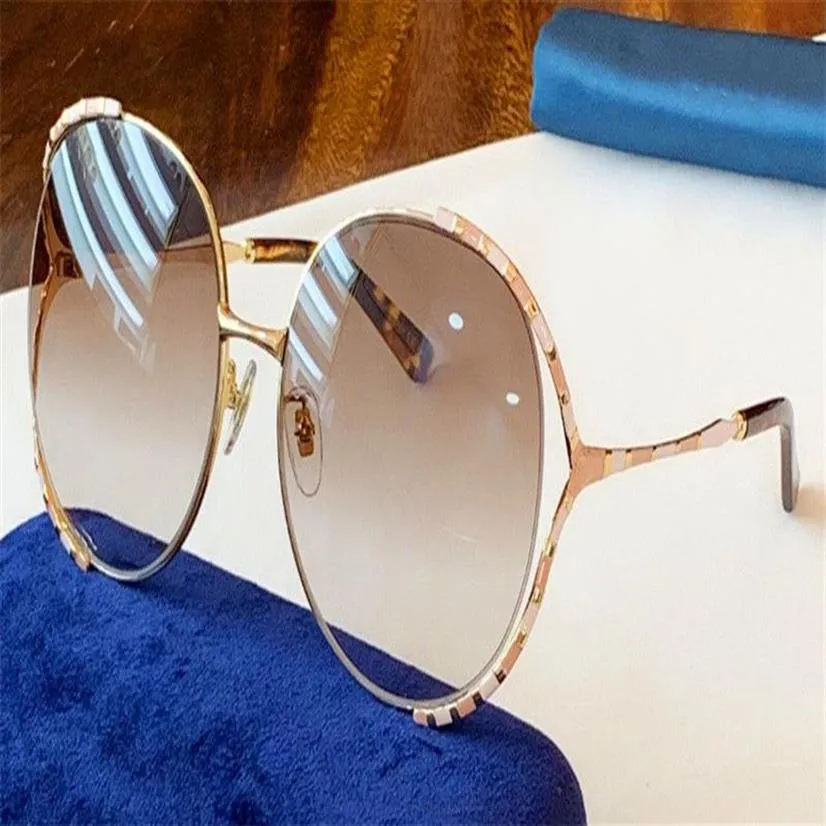 New fashion designer women sunglasses 0595 large frame round hollow frame simple popular glasses top quality uv400 lens outdoor ey241V