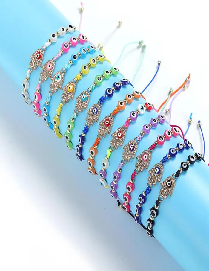 Populära Fatima Hand Charm -armband Färgglada onda ögonpärlor Strängarmband för hela 12stset2610103