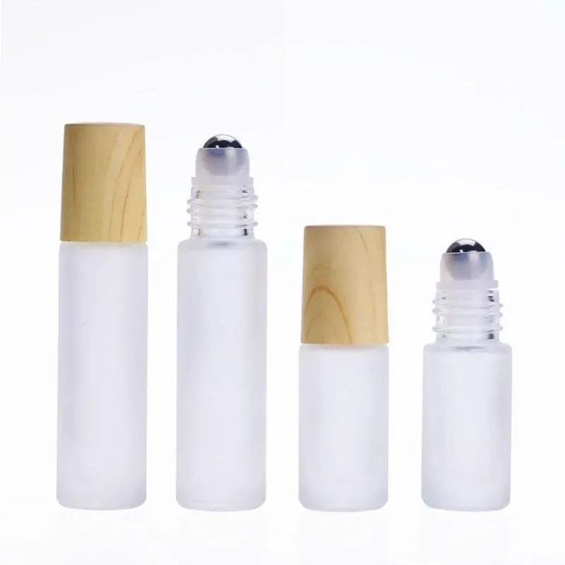 5 ml 10 ml bouteilles à rouleaux en verre bleu clair grosé pour huile essentielle avec balle SS et casquette en plastique de grain de bois 650pcs / lot Vedwi