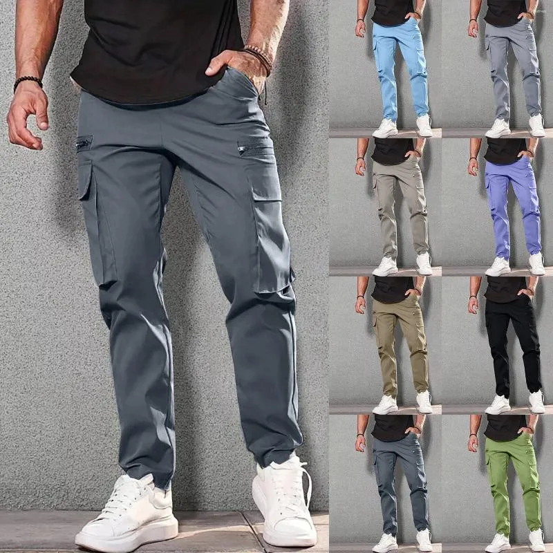 Pantalon masculin cargo détendu en ajustement sport jogger pantalon swing-trake trawsther élastique pantalon de couleur unie extérieure avec poches