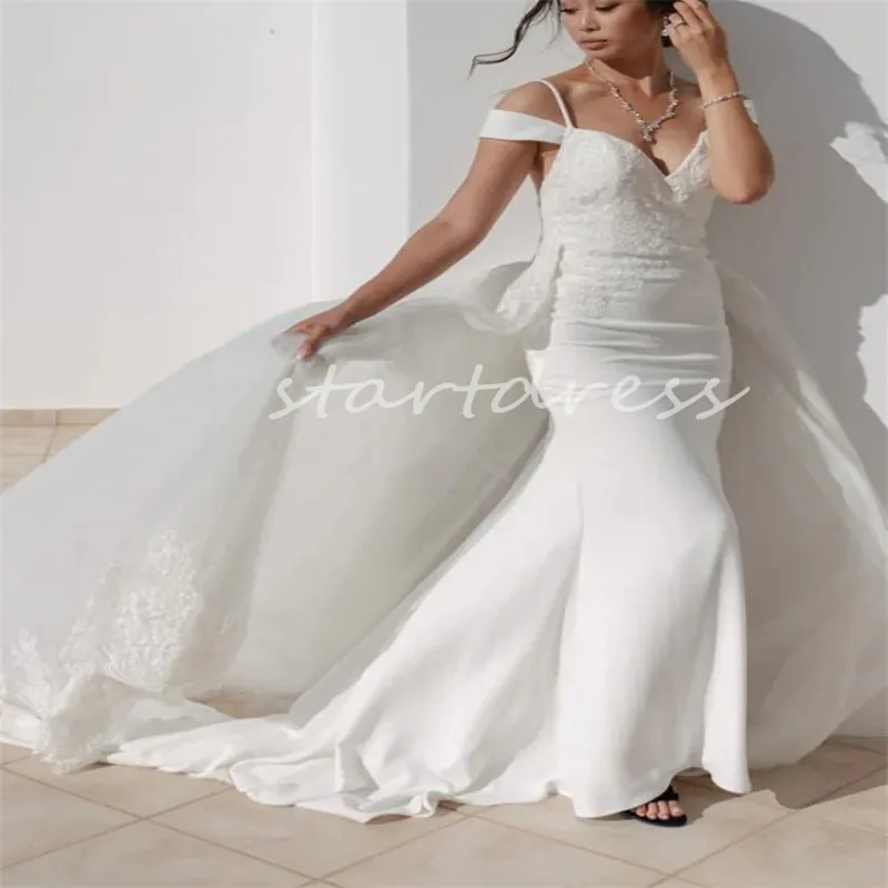 Robe de mariée de sirène blanche de rêve avec overskirt Train Elegant Cap Sleeves Beach Bridal Robes Appliques Lace Church Luxury Country Bride Robe Robe de Mariage 2024