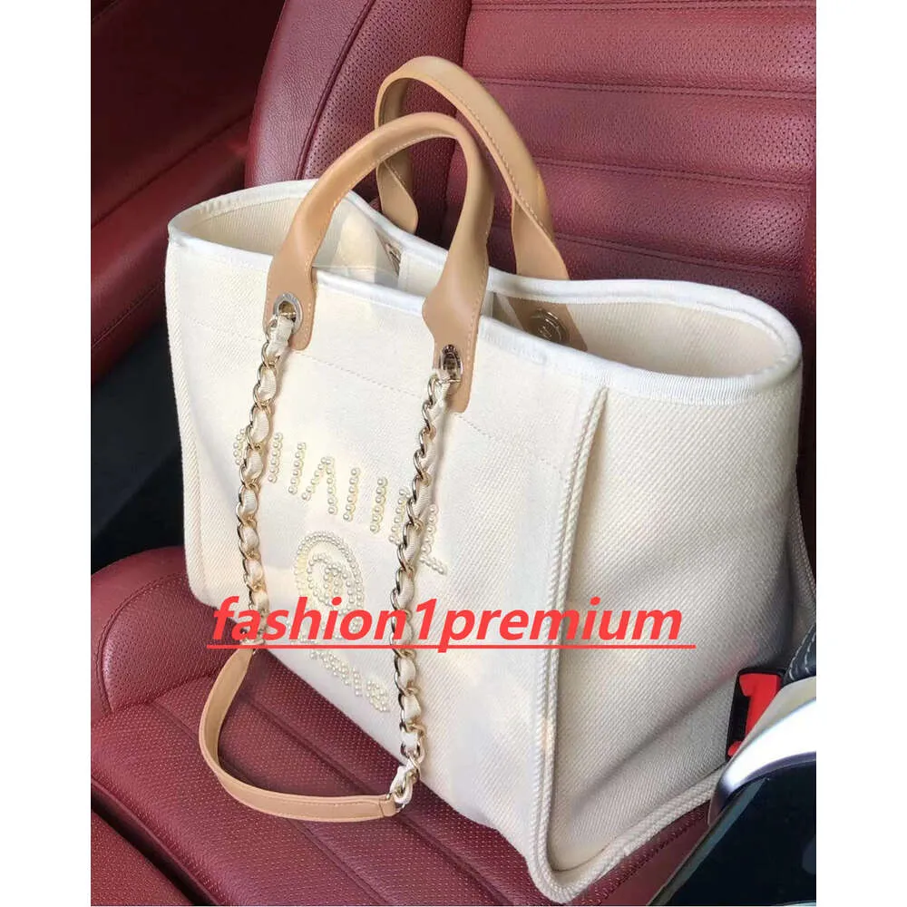 Sagniere di design 5A Women Borse Borse Tote Shopping Borse Borse Borse Borse Canvas Beach Travel Travel Cross Cohching Pull