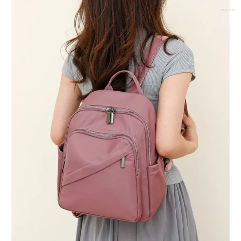 Школьные сумки корейская версия мода Оксфордский рюкзак для женского водонепроницаемого водонепроницаемого нейлонового хранения кросс -куболи