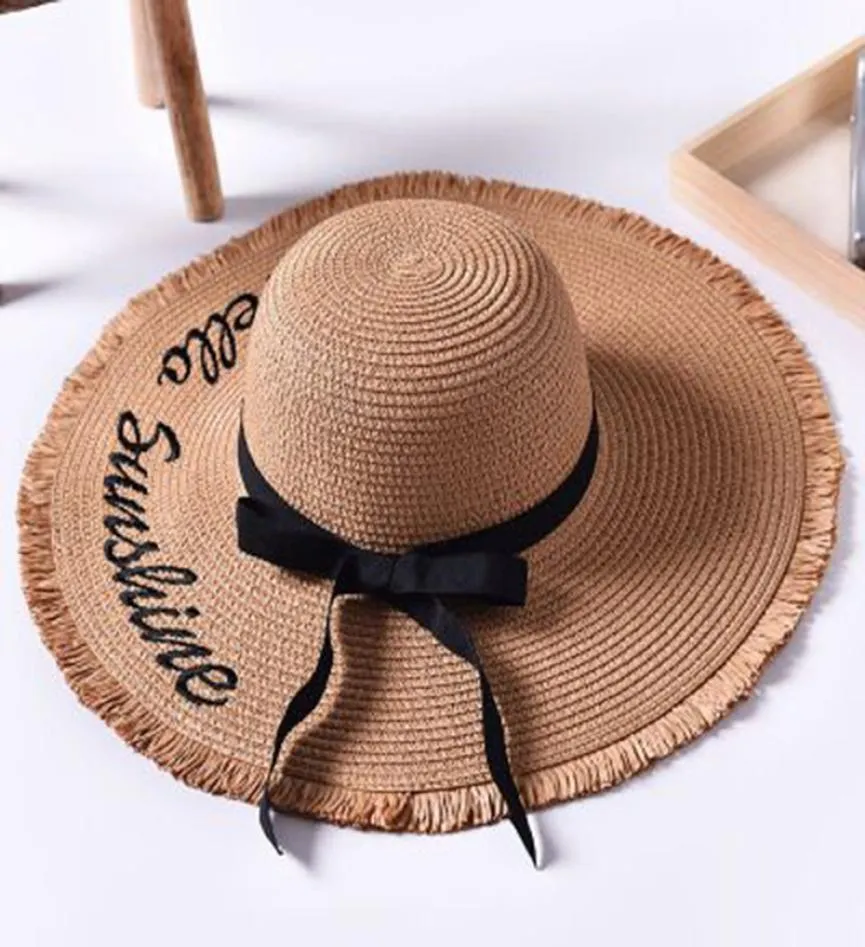 Sombreros para el sol para mujer Tejido hecho a mano bordado de letras Cinta negra con cordones Sombrero de paja de ala grande Sombrero de playa al aire libre Gorras de verano Chap Y9196709