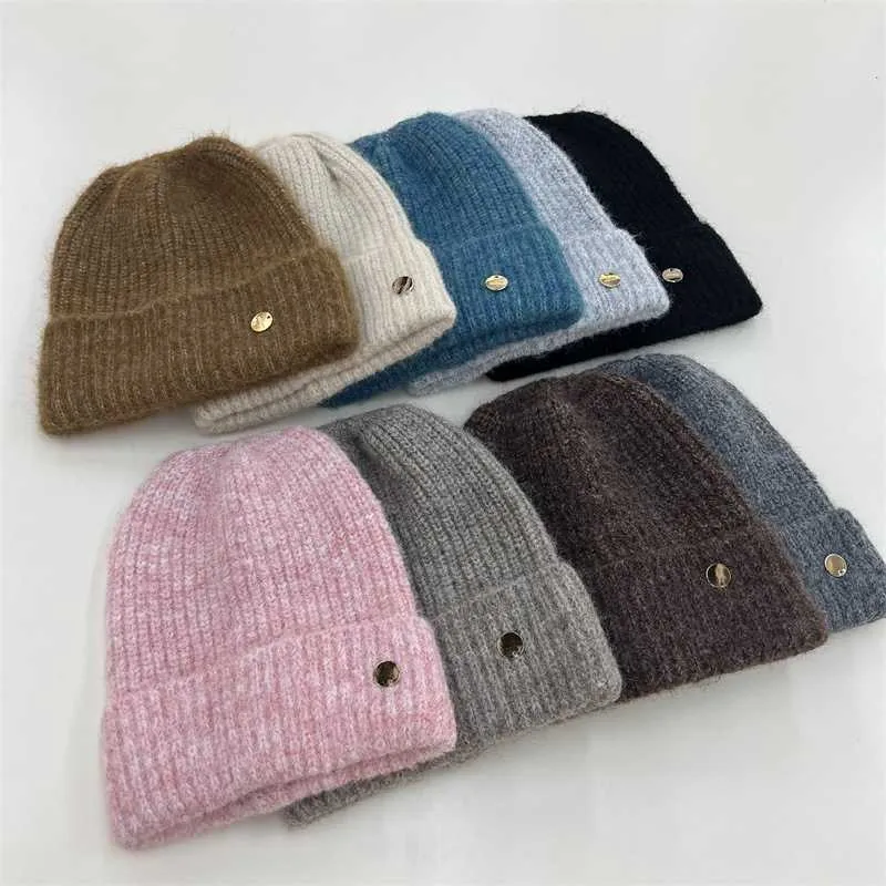 Korean version high-end wool blend yarn curled edge pullover hat for women's autumn and winter warmth and fashion large edition knitted cold hat