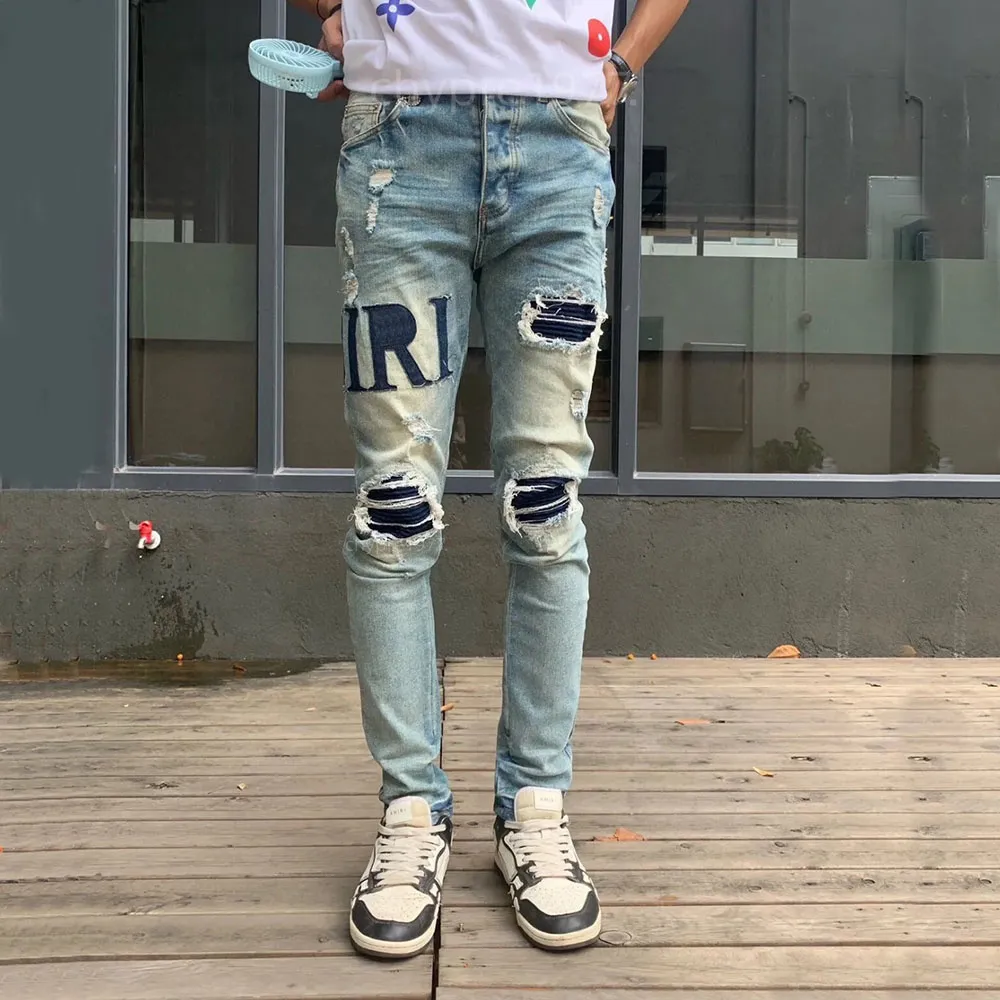 Arrivals Amirs Perforated Jeans Coolgoy Bicycle Men Fashion Tights Rock Revival Letter Pants