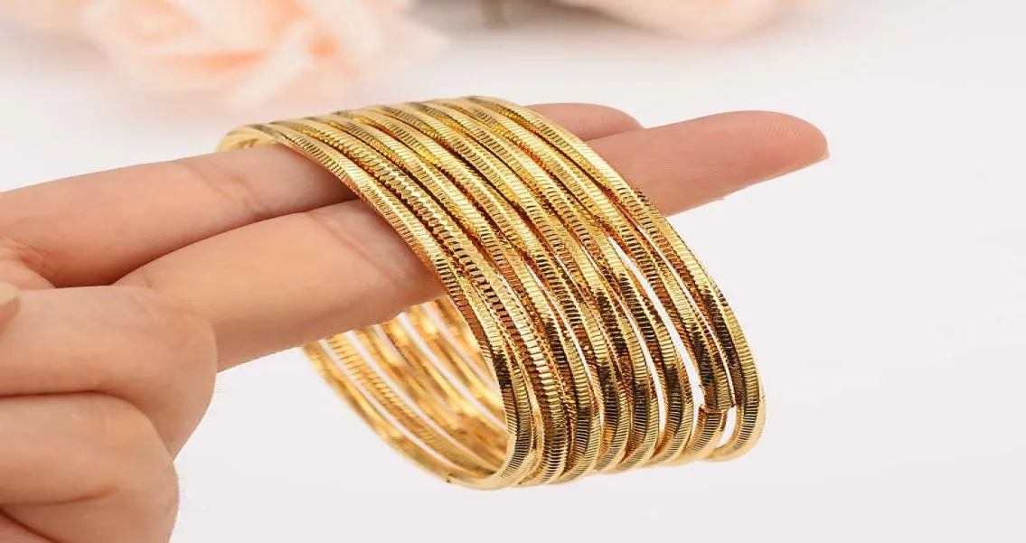 4 stks Dubai India Gouden Armbanden Vrouwen Mannen Armbanden Afrikaanse Europese Ethiopië Meisjes Kids Sieraden Bruid Armbanden Gift Enkelbandje Q07226083413