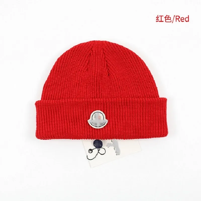 Solidne wełniane czapki hurtowe marka mody dzianin kapelusze wyściełane wełniane czapki na zewnątrz ciepłe czapki jesienią i zimą.