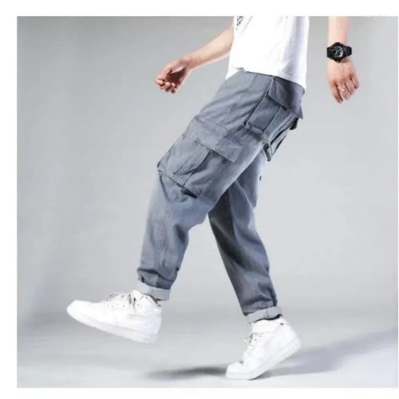 Dżinsy męskie Hip Hop Men Workowate deskorolki Spodnie Hiphop Loose Boys Multi-Papies Dżinsowe spodnie Four Seasons Plus Size 44